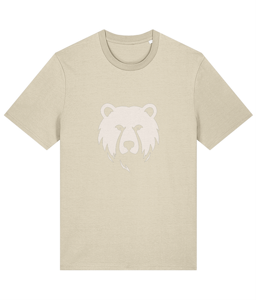 A light beige short-sleeve crewneck t-shirt featuring a tonal, low-contrast white graphic of a bear's head on the chest, displayed against a solid white background.